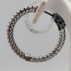 Sterling silver hoops which CZ